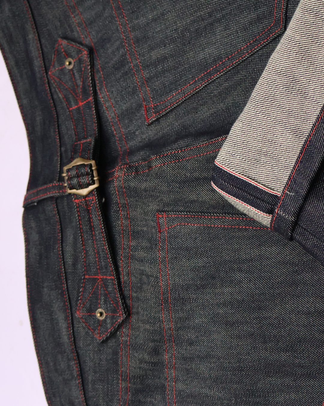 Selvedge back pocket with gold topstitch